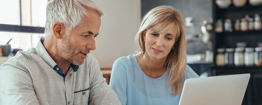 Couple looking at laptop