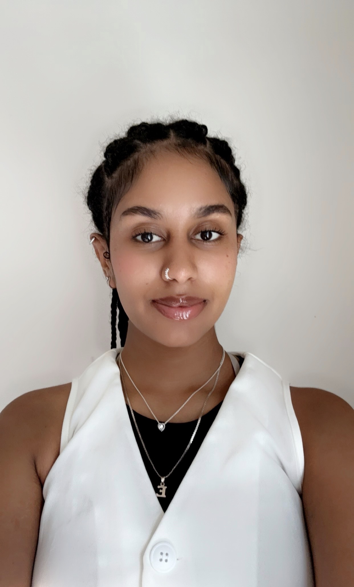 Headshot of Rue Assefa